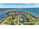 Aerial view of waterfront property with private dock access at 6317 Marbella Blvd, Apollo Beach, FL 33572