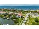 Waterfront home featuring a private pool, lush landscaping, and beautiful ocean views at 6317 Marbella Blvd, Apollo Beach, FL 33572