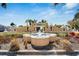 Elegant community entrance with fountains, lush landscaping, and the 'Andalucia' sign at 6317 Marbella Blvd, Apollo Beach, FL 33572
