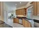 Bright eat in kitchen with stainless appliances and granite countertops overlooks the pool area at 6317 Marbella Blvd, Apollo Beach, FL 33572