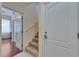 Carpeted staircase leads to the second story of the home at 6317 Marbella Blvd, Apollo Beach, FL 33572