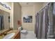 Bathroom featuring vanity with granite countertops, silver shower curtain, and neutral walls at 700 S Harbour Island Blvd # 813, Tampa, FL 33602