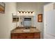 Comfortable bathroom featuring granite vanity and a decorative mirror at 700 S Harbour Island Blvd # 813, Tampa, FL 33602
