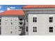 Unique architecture with an orange roof and crisp white trim offers a stylish living experience at 700 S Harbour Island Blvd # 813, Tampa, FL 33602