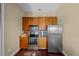 Compact kitchen featuring stainless steel appliances and modern cabinetry and dark floors at 700 S Harbour Island Blvd # 813, Tampa, FL 33602