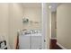 Compact laundry room with washer and dryer provides functionality and convenience at 700 S Harbour Island Blvd # 813, Tampa, FL 33602