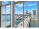 Expansive view of the harbor and city skyline visible through a large picture window at 700 S Harbour Island Blvd # 813, Tampa, FL 33602