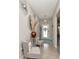 Elegant entryway featuring stylish decor and tile flooring at 7019 Wiseman Run Dr, Sun City Center, FL 33573