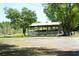Covered outdoor structure or entertainment area, perfect for gatherings at 7040 Lumberton Rd, Zephyrhills, FL 33540