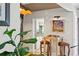 Cozy dining area with unique decor, adjacent to modern kitchen at 720 Brightwaters Ne Blvd, St Petersburg, FL 33704