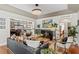 Elegant living room featuring a fireplace, stylish seating, and decorative lighting at 720 Brightwaters Ne Blvd, St Petersburg, FL 33704