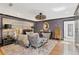 Comfortable bedroom offers a stylish design, soft carpet, and a decorative headboard at 720 Brightwaters Ne Blvd, St Petersburg, FL 33704