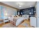 Charming bedroom with custom painted walls and a map, creating a playful and imaginative space at 830 Pinellas Bayway S, St Petersburg, FL 33715