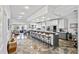 Expansive kitchen featuring a large island with bar seating, modern appliances, and an open layout at 830 Pinellas Bayway S, St Petersburg, FL 33715