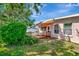 Scenic outdoor view of home featuring a deck, lush lawn, and a well-maintained exterior at 940 43Rd Ne Ave, St Petersburg, FL 33703