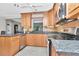 Charming kitchen featuring updated appliances, granite countertops, and ample natural light at 940 43Rd Ne Ave, St Petersburg, FL 33703