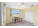 Bright bedroom featuring neutral walls and closet at 9897 Sago Point Dr, Seminole, FL 33777