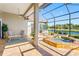 Spacious patio features a jacuzzi and beautiful lake views at 9897 Sago Point Dr, Seminole, FL 33777