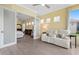 Sitting room leading to the bedroom and backyard at 9897 Sago Point Dr, Seminole, FL 33777