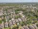Residential aerial view of homes, serene streets, and community amenities at 10524 White Peacock Pl, Riverview, FL 33578