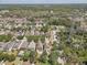Community aerial view, nestled among trees and lush landscaping at 10524 White Peacock Pl, Riverview, FL 33578