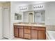 Bright bathroom with a double sink vanity and tile flooring at 10524 White Peacock Pl, Riverview, FL 33578