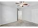 Spacious bedroom with carpet flooring, ample closet space, and neutral paint at 10524 White Peacock Pl, Riverview, FL 33578