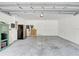 Spacious garage with ample storage space, ready for parking and projects at 10524 White Peacock Pl, Riverview, FL 33578