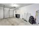 Spacious garage with automatic door, water heater, and room for two cars at 107 Parkside Colony Dr, Tarpon Springs, FL 34689
