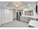 Beautifully renovated kitchen features stainless steel appliances and gray cabinets with white countertops at 107 Parkside Colony Dr, Tarpon Springs, FL 34689