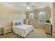Comfortable bedroom with natural light, carpet, and matching nightstands and dressers at 109 Wateredge Ct, Safety Harbor, FL 34695