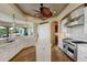 Spacious kitchen with a designer ceiling, state-of-the-art appliances, and hardwood flooring at 109 Wateredge Ct, Safety Harbor, FL 34695