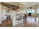 Expansive living area boasts a chef's kitchen, hardwood floors, and abundant natural light at 109 Wateredge Ct, Safety Harbor, FL 34695
