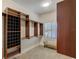 Walk-in closet with custom shelving and storage solutions, maximizing space and organization at 109 Wateredge Ct, Safety Harbor, FL 34695