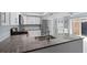 Kitchen with stainless steel appliances, granite countertops and breakfast bar at 11368 93Rd St, Largo, FL 33773