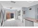 Kitchen with tile floors and laundry closet at 11368 93Rd St, Largo, FL 33773