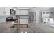 Kitchen with stainless steel appliances and granite countertops at 11368 93Rd St, Largo, FL 33773