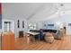 Open-concept living space with hardwood floors and views of the backyard pool area at 11368 93Rd St, Largo, FL 33773