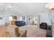 Bright living room with hardwood floors and sliding glass doors leading to the outdoor area at 11368 93Rd St, Largo, FL 33773