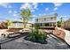 Spacious backyard featuring lush landscaping, a fire pit, and a wooden deck at 12525 Sparkleberry Rd, Tampa, FL 33626