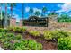 Beautiful Westwood Lakes community entrance with stone signage and well-manicured landscaping at 12525 Sparkleberry Rd, Tampa, FL 33626