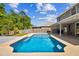 Beautiful swimming pool in backyard of home at 12525 Sparkleberry Rd, Tampa, FL 33626