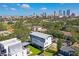 Stunning aerial view of the modern home showcasing the downtown city skyline backdrop at 1312 W Azeele St # 2, Tampa, FL 33606