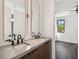 Modern bathroom featuring double sinks, sleek fixtures, and contemporary design elements for a luxurious feel at 1312 W Azeele St # 2, Tampa, FL 33606