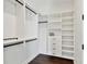 Walk-in closet with custom shelving and ample storage space for organizing your wardrobe at 1312 W Azeele St # 2, Tampa, FL 33606