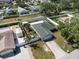Aerial view highlighting the property's layout, including the backyard, pool, and detached garage at 1601 14Th W St, Palmetto, FL 34221