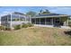This home features a screened in porch, and a screened in pool with plenty of yard space at 1601 14Th W St, Palmetto, FL 34221