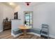 Cozy dining area with a built-in bench and a view of the natural outdoor light at 1601 14Th W St, Palmetto, FL 34221