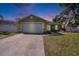 Charming single-story home with a well-maintained lawn and a two-car garage at 1601 14Th W St, Palmetto, FL 34221