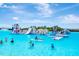 View of an exciting water park area with slides, climbing structures, and various water activities for all ages at 16633 Mooner Plank Cir, Wimauma, FL 33598